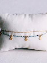 Minimalistisches Doppelarmband mit Kordel und Sternen - Unique Flores